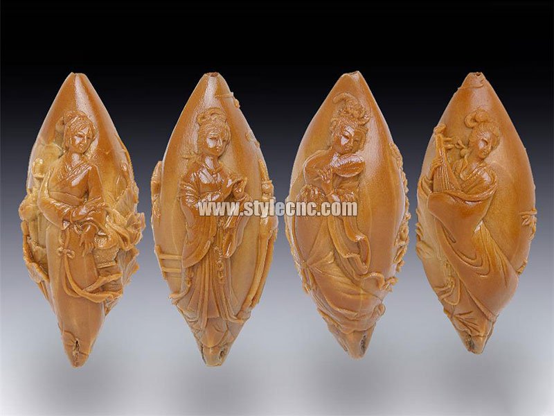 使用數(shù)控雕刻機(jī)對劣質(zhì)橄欖核進(jìn)行雕刻